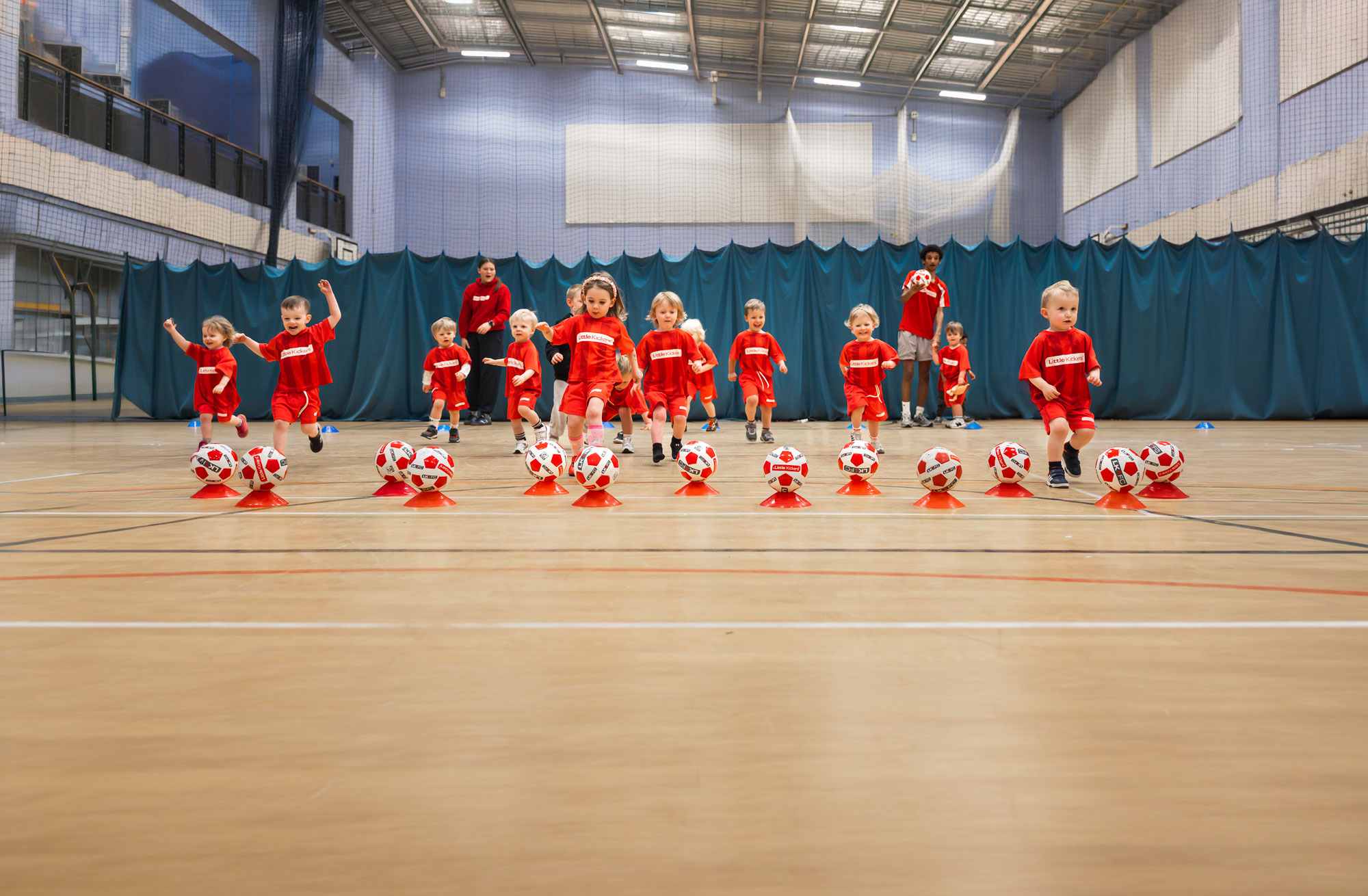 Little Kickers players running
